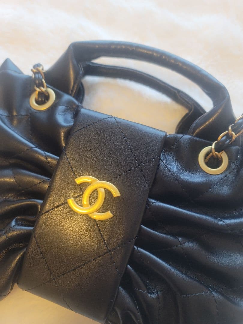 ノベルティ CHANEL ブラックリボンショルダーバッグ キルティング
