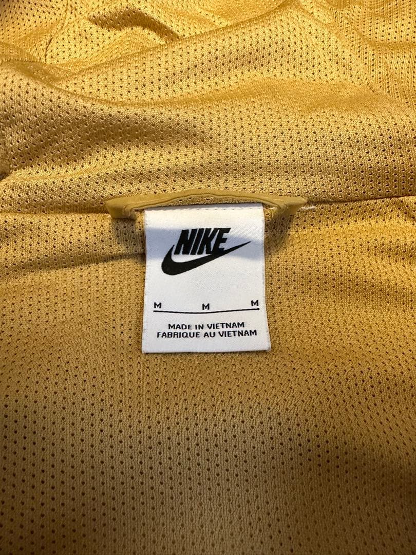 Nike ネイビー ゴールド ウィンドブレーカー