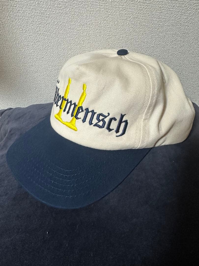 ÜBERMENSCH UNSTRUCTURED SNAPBACK HAT