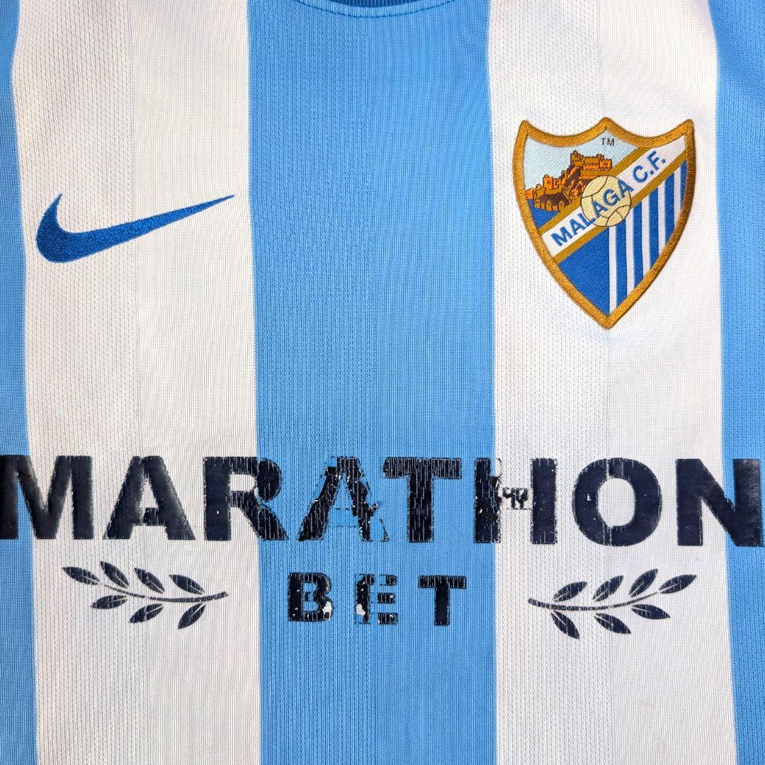古着 サッカー ユニフォーム ゲームシャツ マラガ NIKE ナイキ メンズ L