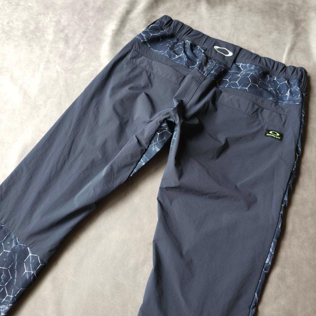 【オークリーゴルフ】蓄熱HEAT×防風 グラフィックデザイン 秋冬ゴルフバンツM