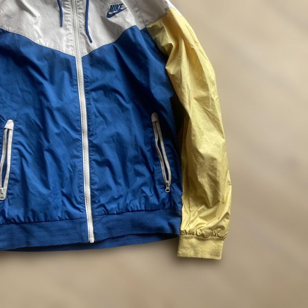 Nike ウィンドブレーカーレディース 赤/青/黄色