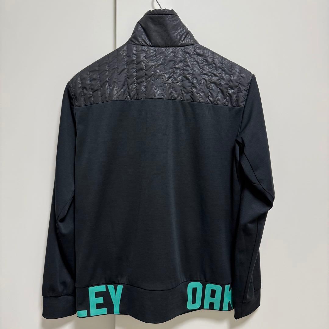 超美品 OAKLEY オークリー 中綿切替 ゴルフウェア ジャケット M